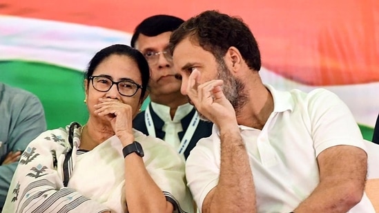 West Bengal chief minister Mamata Banerjee interacts with Congress leader Rahul Gandhi during Opposition parties meet, in Bengaluru. (ANI /File)
