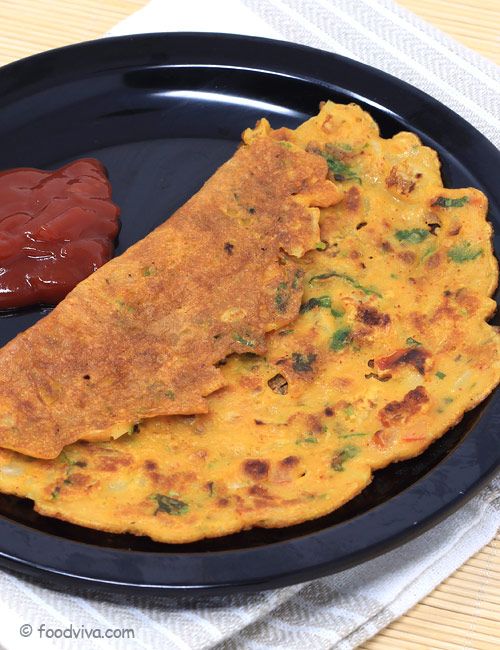 Besan chilla with paneer is a protein-rich savory pancake made from gram flour and stuffed with spiced paneer.