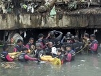 Joy's body was located around a kilometre away from the spot he went missing, from a canal stretch behind Sree Chitra Home at Thakarapparambu in Thiruvananthapuram(PTI Photo) Joy's body was located around a kilometre away from the spot he went missing, from a canal stretch behind Sree Chitra Home at Thakarapparambu in Thiruvananthapuram(PTI Photo)