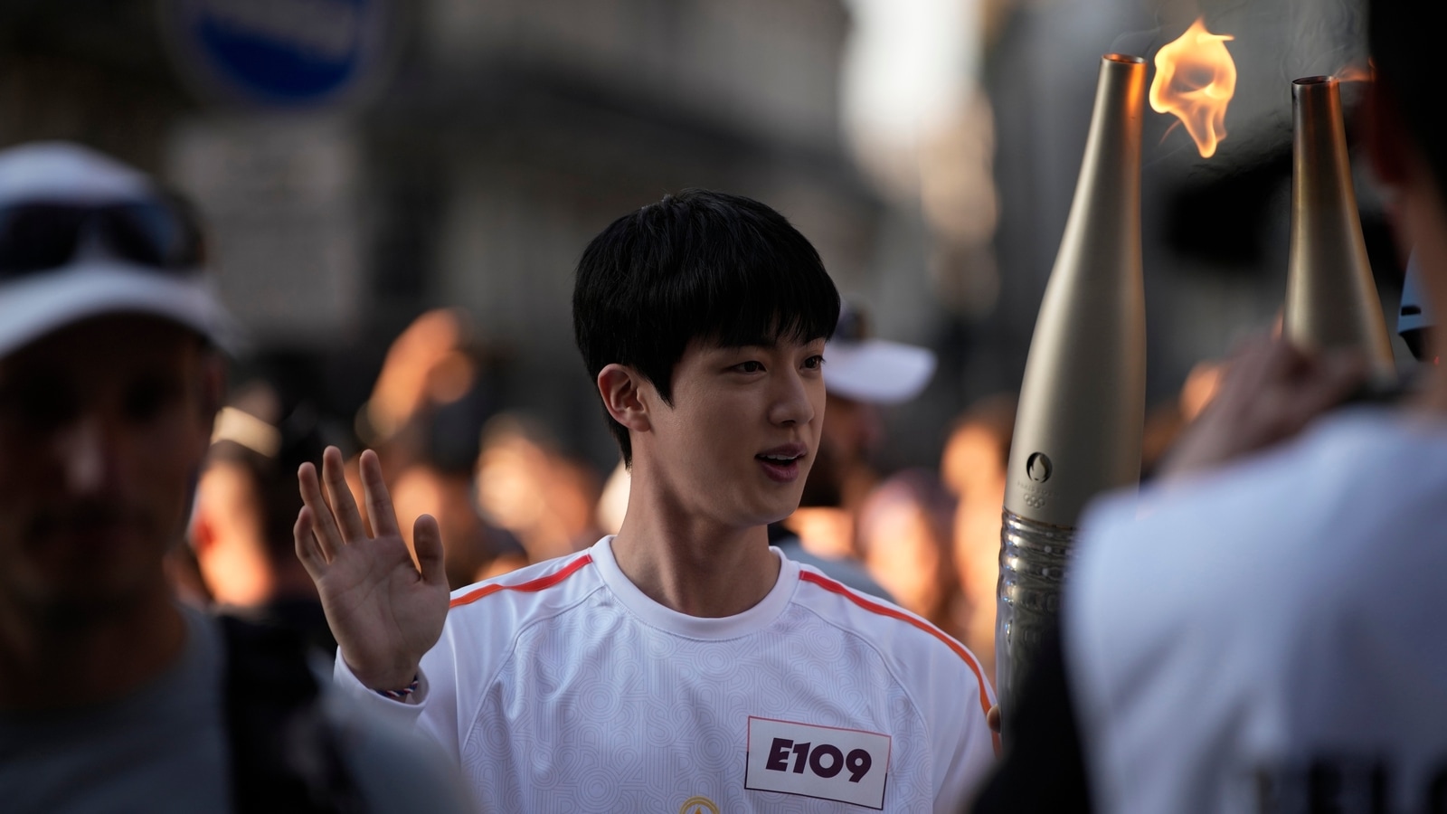 BTS' Jin carries Olympic torch ahead of 2024 Paris Olympics. See pics ...