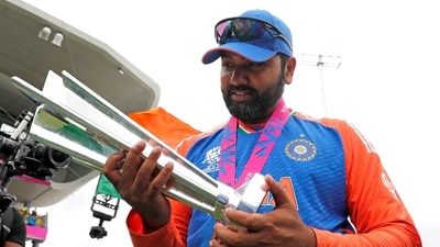 India's captain Rohit Sharma poses for a picture with the trophy after Team India won the ICC Mens T20 World Cup 2024 final match against South Africa (ANI) India's captain Rohit Sharma poses for a picture with the trophy after Team India won the ICC Mens T20 World Cup 2024 final match against South Africa (ANI)