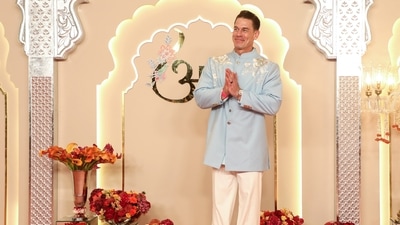 Wrestler and actor John Cena poses for a picture on his arrival for Reliance Industries Chairman Mukesh Ambani's son Anant Ambani and Radhika Merchant's wedding, at the Jio World Convention Centre, in Mumbai on Friday. (ANI Photo) Wrestler and actor John Cena poses for a picture on his arrival for Reliance Industries Chairman Mukesh Ambani's son Anant Ambani and Radhika Merchant's wedding, at the Jio World Convention Centre, in Mumbai on Friday. (ANI Photo)