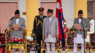 Newly elected Prime Minister Khadga Prasad Oli, right, is being sworn by President Ram Chandra Paudel, left, at the Presidential residence in Kathmandu, Nepal, Monday, July 15, 2024. Khadga Prasad Oli, the leader of Nepal���s largest communist party, was named prime minister on Sunday following the collapse of a previous coalition government. AP/PTI(AP07_15_2024_000199A) (AP) Newly elected Prime Minister Khadga Prasad Oli, right, is being sworn by President Ram Chandra Paudel, left, at the Presidential residence in Kathmandu, Nepal, Monday, July 15, 2024. Khadga Prasad Oli, the leader of Nepal���s largest communist party, was named prime minister on Sunday following the collapse of a previous coalition government. AP/PTI(AP07_15_2024_000199A) (AP)