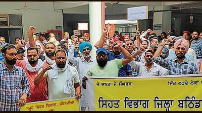 Health services at the Shaheed Bhai Mani Singh Civil Hospital in Bathinda were paralysed on the fourth day on Monday as the employee unions observed a strike, demanding release of a class IV staffer. (HT) Health services at the Shaheed Bhai Mani Singh Civil Hospital in Bathinda were paralysed on the fourth day on Monday as the employee unions observed a strike, demanding release of a class IV staffer. (HT)