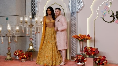 Nick Jonas with Priyanka Chopra posed for pictures on the red carpet on the day of the wedding of Anant Ambani and Radhika Merchant in Mumbai. After posing for paparazzi, the actor and US singer also added glamour to the festivities and were seen dancing and letting their hair down at the venue. (REUTERS) 