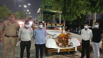 Police seized the vintage car, ingeniously converted into a mobile bar. The suspects had set up the mobile bar during a wedding function at Sector 73-located Shaurya Banquet hall on Sunday (HT Photo)