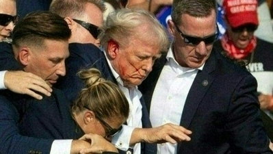 Former President and Republican candidate Donald Trump was injured in the ear during an apparent assassination attempt by a gunman at a campaign rally in Butler, Pennsylvania, on Saturday, July 13. (AFP) Former President and Republican candidate Donald Trump was injured in the ear during an apparent assassination attempt by a gunman at a campaign rally in Butler, Pennsylvania, on Saturday, July 13. (AFP)