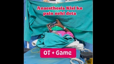 Snapshot of the patient playing video game while in operation theatre.