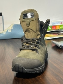 Safety shoes with a "Russian Army" badge (ANI) Safety shoes with a "Russian Army" badge (ANI)