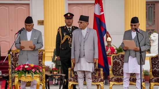 Newly elected Prime Minister Khadga Prasad Oli, right, is being sworn by President Ram Chandra Paudel, left, at the Presidential residence in Kathmandu, Nepal, Monday, July 15, 2024. Khadga Prasad Oli, the leader of Nepal???s largest communist party, was named prime minister on Sunday following the collapse of a previous coalition government. AP/PTI(AP07_15_2024_000199A)(AP)