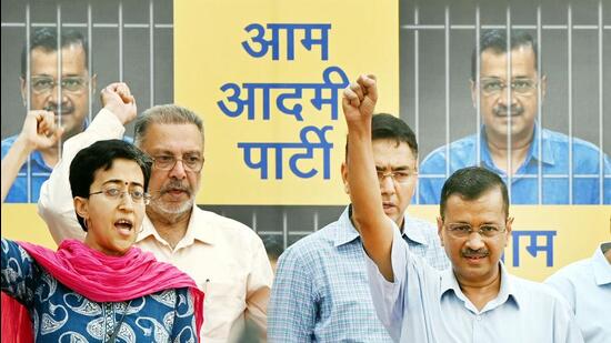 Arvind Kejriwal and Delhi minister Atishi on their campaign for the Lok Sabha polls. (HT File Photo)