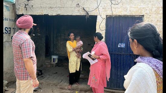 Health staff during a door-to-door screening in Jhill area of Patiala district on Monday. (HT photo)