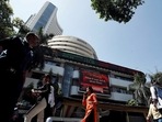 People walk past the Bombay Stock Exchange (BSE) building in Mumbai (Francis Mascarenhas/Reuters)
