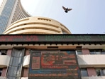 Stock market holiday on July 17: A bird flies past a screen displaying the Sensex results on the facade of the Bombay Stock Exchange (BSE) building in Mumbai.