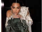 Kim Kardashian poses for photos during the wedding festivities of Anant Ambani and Radhika Merchant in Mumbai.