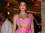 Khloe Kardashian shares photos of her Manish Malhotra outfit at Ambani wedding.