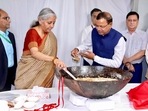 Union finance minister Nirmala Sitharaman with union minister of state for finance Pankaj Chaudhary during the 'halwa' ceremony. Union finance minister Nirmala Sitharaman with union minister of state for finance Pankaj Chaudhary during the 'halwa' ceremony.