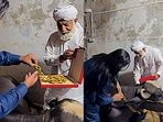 Man adorning the gold chain on the buffalo. (Instagram/@MuhammadDanishYaqoob) Man adorning the gold chain on the buffalo. (Instagram/@MuhammadDanishYaqoob)