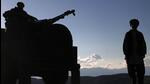 Taliban security personnel stand guard near a poppy field in Argo district on May 12, 2024 (AFP FILE PHOTO) Taliban security personnel stand guard near a poppy field in Argo district on May 12, 2024 (AFP FILE PHOTO)