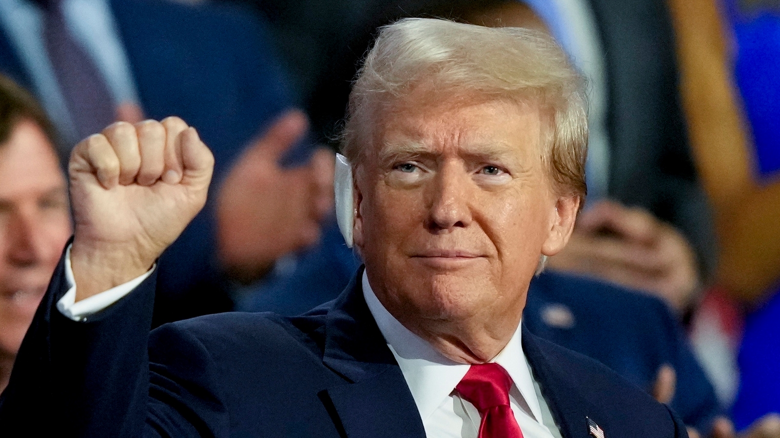 Donald Trump greeted with massive applause as he appears at RNC with bandaged ear: Watch