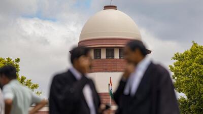 Lawyers at the Supreme Court of India in New Delhi. (PTI Photo) Lawyers at the Supreme Court of India in New Delhi. (PTI Photo)