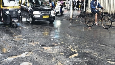 Mumbai, India. July, 15, 2024: Several potholes on SV Road at Lucky junction in Bandra west in Mumbai. July 15, 2024. (Photo by Raju Shinde/HT Photo) Mumbai, India. July, 15, 2024: Several potholes on SV Road at Lucky junction in Bandra west in Mumbai. July 15, 2024. (Photo by Raju Shinde/HT Photo)