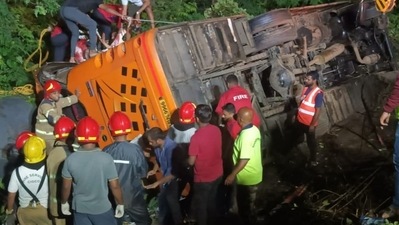A bus carrying 51 people collided with a tractor and plunged into a ditch shortly after midnight on Tuesday. HT Photo/Bachchan Kumar A bus carrying 51 people collided with a tractor and plunged into a ditch shortly after midnight on Tuesday. HT Photo/Bachchan Kumar