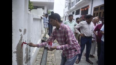 Officials marking a house in Rahim Nagar recently. (File Photo) Officials marking a house in Rahim Nagar recently. (File Photo)