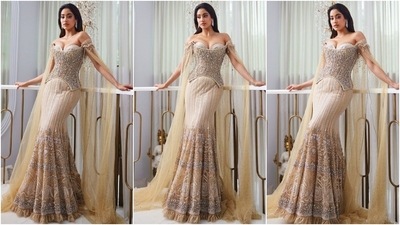 Janhvi wore an art nouveau-inspired structured sweeping skirt hand-embroidered with crystals, pearls and sequins. She paired it with a complementing crystal embellished sculpted corset attached with draped sequinned wings. (Instagram) Janhvi wore an art nouveau-inspired structured sweeping skirt hand-embroidered with crystals, pearls and sequins. She paired it with a complementing crystal embellished sculpted corset attached with draped sequinned wings. (Instagram)