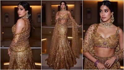Janhvi Kapoor arrived decked in gold for Anant and Radhika's wedding ceremony. She wore a custom-designed Falguni Shane Peacock lehenga for the occasion. The ensemble celebrated her deep-rooted connection to her ancestry, admiration for temple jewellery, and exquisite craftsmanship. (Instagram) Janhvi Kapoor arrived decked in gold for Anant and Radhika's wedding ceremony. She wore a custom-designed Falguni Shane Peacock lehenga for the occasion. The ensemble celebrated her deep-rooted connection to her ancestry, admiration for temple jewellery, and exquisite craftsmanship. (Instagram)