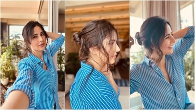 One cannot list Katrina's best fashion moments without mentioning her girl-next-door look; these pictures perfectly capture the aesthetic. The actor wore a striped blue shirt and denim jeans with a messy twisted bun and minimal makeup. (Instagram) One cannot list Katrina's best fashion moments without mentioning her girl-next-door look; these pictures perfectly capture the aesthetic. The actor wore a striped blue shirt and denim jeans with a messy twisted bun and minimal makeup. (Instagram)