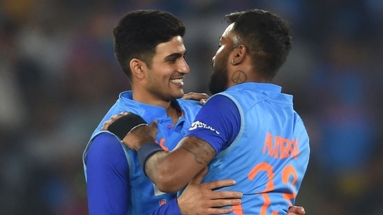 India's Shubman Gill (C) and teammate Hardik Pandya (R)(AFP)