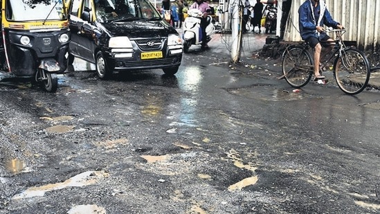 Mumbai, India. July, 15, 2024: Several potholes on SV Road at Lucky junction in Bandra west in Mumbai. July 15, 2024. (Photo by Raju Shinde/HT Photo)
