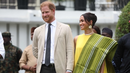 Prince Harry and Meghan Markle's children, Archie and Lilibet, are now officially known as Prince and Princess Sussex. (Photo by Kola SULAIMON / AFP)(AFP)