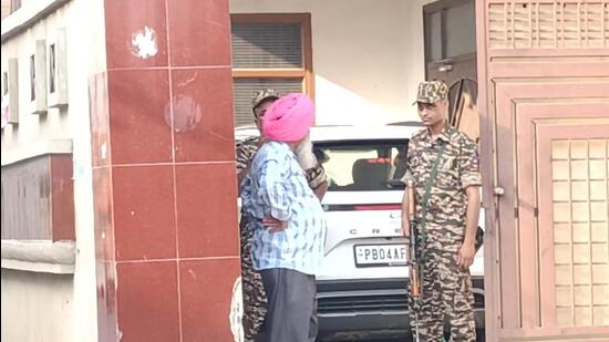 Paramilitary forces outside the Faridkot residence of liquor baron Deep Malhotra during the ED raid on Tuesday. (HT Photo)