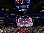 Former US President and 2024 Republican presidential candidate Donald Trump (top, on monitor) watches as US former ambassador to the United Nations and former South Carolina Governor Nikki Haley speaks during the second day of the 2024 Republican National Convention at the Fiserv Forum in Milwaukee, Wisconsin, July 16, 2024. Days after he survived an assassination attempt Donald Trump won formal nomination as the Republican presidential candidate and picked right-wing loyalist J.D. Vance for running mate, kicking off a triumphalist party convention in the wake of last weekend's failed assassination attempt. (Photo by Pedro UGARTE / AFP)(AFP) Former US President and 2024 Republican presidential candidate Donald Trump (top, on monitor) watches as US former ambassador to the United Nations and former South Carolina Governor Nikki Haley speaks during the second day of the 2024 Republican National Convention at the Fiserv Forum in Milwaukee, Wisconsin, July 16, 2024. Days after he survived an assassination attempt Donald Trump won formal nomination as the Republican presidential candidate and picked right-wing loyalist J.D. Vance for running mate, kicking off a triumphalist party convention in the wake of last weekend's failed assassination attempt. (Photo by Pedro UGARTE / AFP)(AFP)
