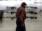 DALLAS, TEXAS - MAY 17: An attendee walks by guns displayed in the Daniel Defense booth during the National Rifle Association (NRA) Annual Meeting & Exhibits at the Kay Bailey Hutchison Convention Center on May 17, 2024 in Dallas, Texas.(Getty Images via AFP) DALLAS, TEXAS - MAY 17: An attendee walks by guns displayed in the Daniel Defense booth during the National Rifle Association (NRA) Annual Meeting & Exhibits at the Kay Bailey Hutchison Convention Center on May 17, 2024 in Dallas, Texas.(Getty Images via AFP)
