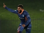 Wanindu Hasaranga celebrates a wicket. Wanindu Hasaranga celebrates a wicket.