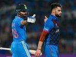 Virat Kohli and Naveen ul Haq during India and Afghanistan encounter in ICC World Cup.(Twitter) Virat Kohli and Naveen ul Haq during India and Afghanistan encounter in ICC World Cup.(Twitter)