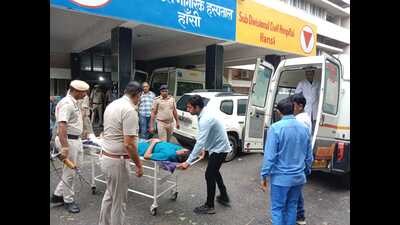 A gangster being rushed to the civil hospital after being shot on a leg in Hansi on Wednesday. (HT Photo)