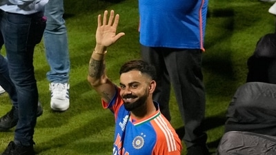 Virat Kohli waves during a ceremony at Wankhede Stadium, Mumbai, celebrating India's T20 World Cup win. (AP) Virat Kohli waves during a ceremony at Wankhede Stadium, Mumbai, celebrating India's T20 World Cup win. (AP)
