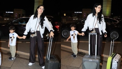 Natasa Stankovic with her son Agastya at the Mumbai airport. Natasa Stankovic with her son Agastya at the Mumbai airport.