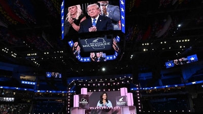 Former US President and 2024 Republican presidential candidate Donald Trump (top, on monitor) watches as US former ambassador to the United Nations and former South Carolina Governor Nikki Haley speaks during the second day of the 2024 Republican National Convention at the Fiserv Forum in Milwaukee, Wisconsin, July 16, 2024. Days after he survived an assassination attempt Donald Trump won formal nomination as the Republican presidential candidate and picked right-wing loyalist J.D. Vance for running mate, kicking off a triumphalist party convention in the wake of last weekend's failed assassination attempt. (Photo by Pedro UGARTE / AFP) (AFP) Former US President and 2024 Republican presidential candidate Donald Trump (top, on monitor) watches as US former ambassador to the United Nations and former South Carolina Governor Nikki Haley speaks during the second day of the 2024 Republican National Convention at the Fiserv Forum in Milwaukee, Wisconsin, July 16, 2024. Days after he survived an assassination attempt Donald Trump won formal nomination as the Republican presidential candidate and picked right-wing loyalist J.D. Vance for running mate, kicking off a triumphalist party convention in the wake of last weekend's failed assassination attempt. (Photo by Pedro UGARTE / AFP) (AFP)