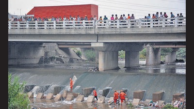 There is no trace of the 10-year-old boy who was washed away in a seasonal drain in Budhanpur village of Panchkula amid the downpour on Tuesday. (HT File)