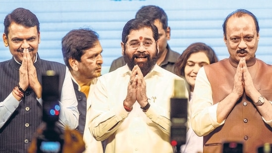 Maharashtra chief minister Eknath Shinde with deputy CMs Devendra Fadnavis of the BJP and NCP chief Ajit Pawar(Satish Bate/HT )