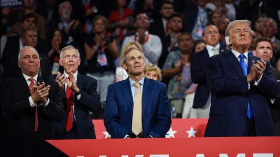 Former US President Donald Trump (right) applaud speakers on the second day of the Republican National Convention at the Fiserv Forum in Milwaukee, Wisconsin, on Tuesday. (AFP)