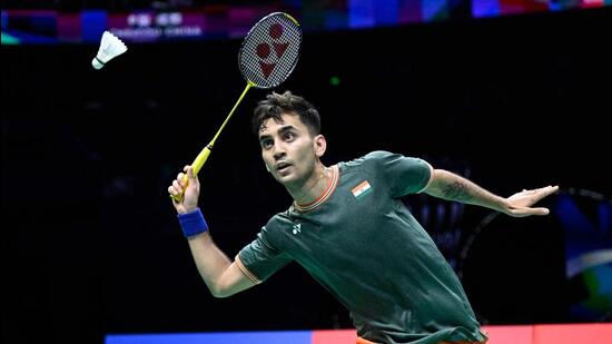 Lakshya Sen hits a return to China's Li Shifeng during their quarter-final match at the Thomas and Uber Cup badminton tournament in Chengdu, China. (AFP)