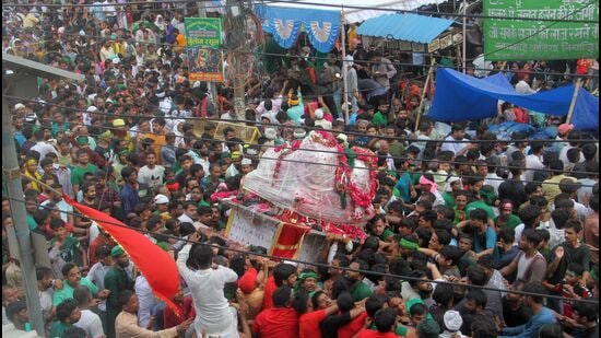 Moharram procession being taken out in old city area of Chioek in Prayagraj on Wednesday (HT Photo)