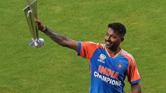 The T20 World Cup-winning Indian cricket team?s Hardik Pandya holds the championship trophy during a felicitation ceremony at the Wankhede Stadium(PTI)