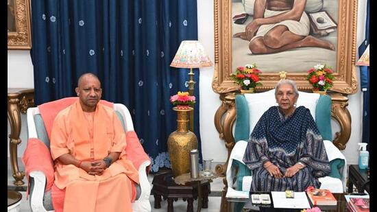 Uttar Pradesh chief minister Yogi Adityanath meets governor Anandiben Patel, at Raj Bhavan in Lucknow. (PTI Photo)